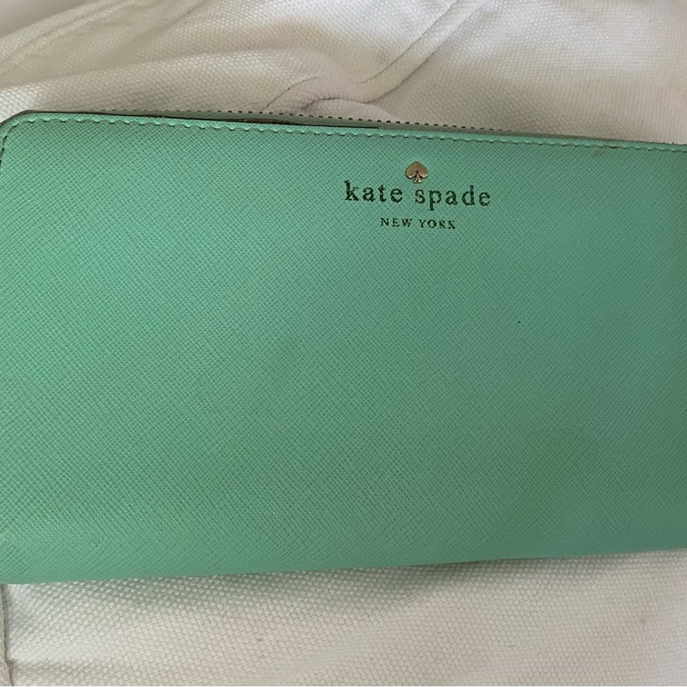 Kate Spade Cobalt Blue Wallet. Used. Scuffs on the back. Good condition. Tiffany